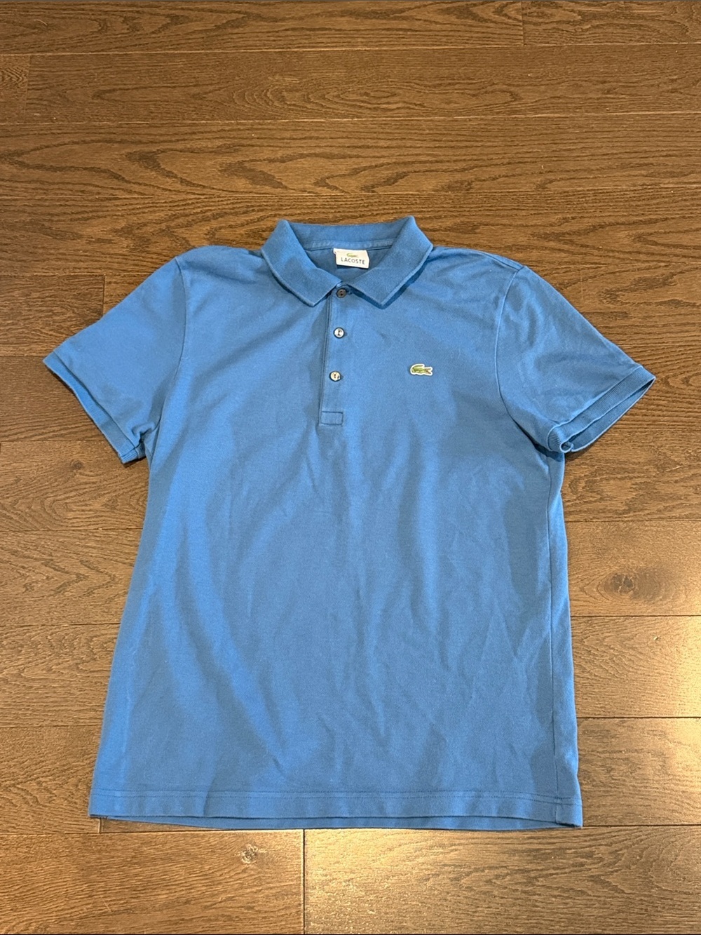 Lacoste blue short sleeve polo size 5
